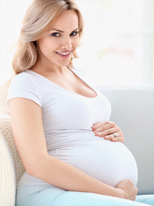 preggo girl assumes the doggy style position naked